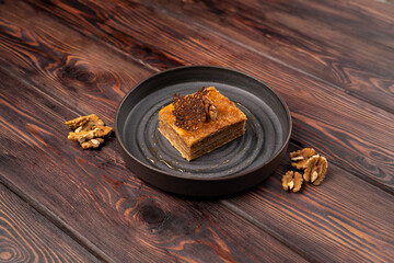 Napoleon puff cake soaked in boiled condensed milk