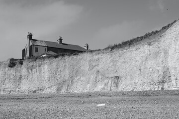 Black and white images of the white cliffs at Burling Gap, Eastbourne. Spectacular scenery of chalk rock formation and part of the Southern English coastal path, 