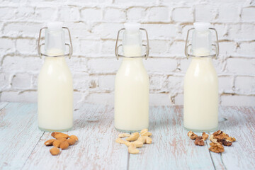 nut milk in glass bottles