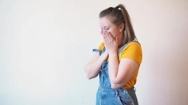 Happy Woman Play With Brush And Drops Her. Independent Single Female Makes DIY Repairs In Her Apartment. Fail With Unsuccessful Drop Of The Brush