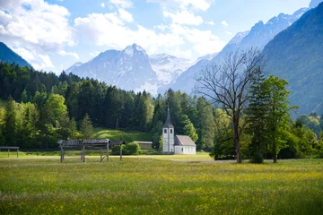 Fotobehang Mojstrana St Clement’s church under alps © Vesna