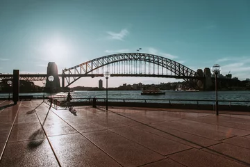 Poster "Sydney, NSW / Australia - April 17, 2020: Sydney Opera House and Circular Quay surroundings completely isolated and with social distancing under lockdown due to Coronavirus outbreak" © Juan