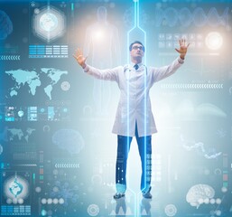 Doctor in futuristic medical concept pressing button