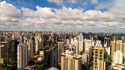 Fototapeta na wymiar Aerial view of the Itaim Bibi region, with Av. Paulista and Ibirapuera Park in the background