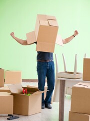 Man moving house with boxes