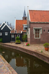 The small town of Volendam, on Markermeer Lake, northeast of Amsterdam, which is known for its colorful wooden houses and the old fishing boats.