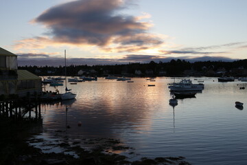 Fototapeta na wymiar Boats anchored at dawn in Bass Harbor, Maine