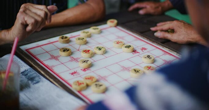Xiangqi Also Known as Chinese Chess Being Played in Miri, East Malaysia