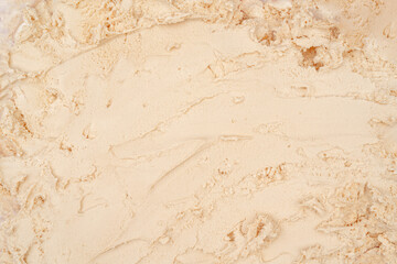Closeup shot of beige vanilla ice cream texture