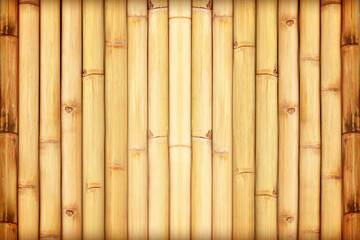 Old bamboo fence background; Old natural bamboo fence texture background