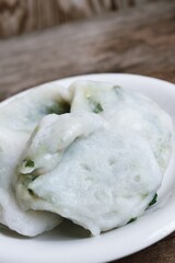 Steam dumplings chives Chinese food on wood table background
