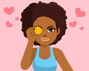 Beautiful black woman holding golden bitcoin over eye cryptocurrency love money concept