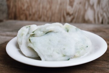 Steam dumplings chives Chinese food on wood table background