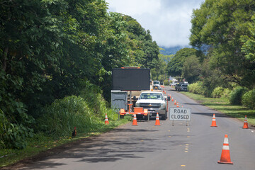 Road closed to traffic with signs and cones