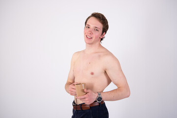 Fototapeta premium Attractive guy posing in the studio.