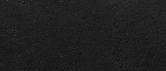 Panorama of Old cement wall painted black, peeling paint texture and background