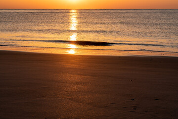 Obraz premium Wild Dunes Resort, South Carolina, USA - April 5, 2021. Early morning beach front scenery at sunrise.