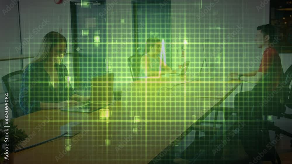 Poster animation of glowing heart rate monitor and data on grid, over colleagues working on laptops