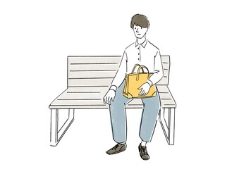 ベンチに座るビジネスマン