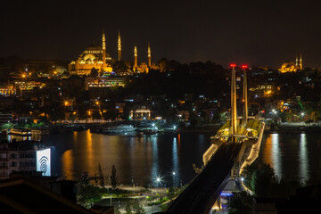 Night view of Istanbull across the bosfor - obrazy, fototapety, plakaty