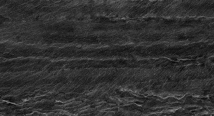 Dark grey black slate background or texture.