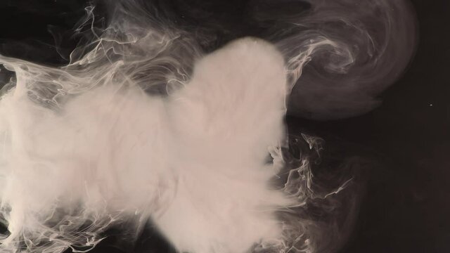 White goes "pooof," and out comes lovely wisps of whiteness, which swirl  -  an all natural AbstractVideoClip