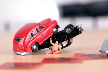 Miniature scene of a car accident with drunk driving