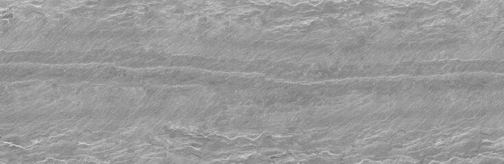 Panorama abstract stone background. The texture of the stone wall. Close-up. Light gray rock backdrop