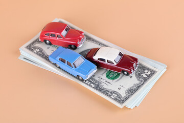 Car model on dollar bills