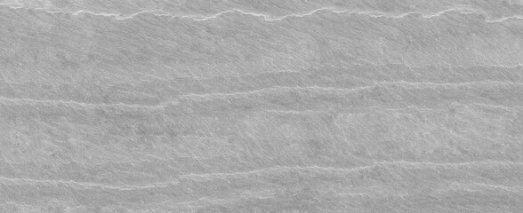 Panorama gray grunge banner. Abstract stone background. The texture of the stone wall. Close-up. Light gray rock backdrop