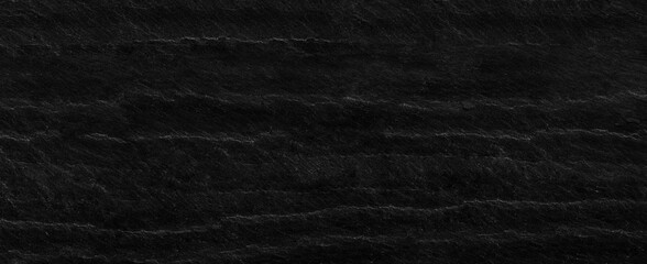 Panorama black rock background. Dark gray stone texture. Black grunge background.