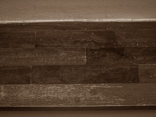 Old aged of parquet wood flooring with scratch and rough surface. Vintage background concept. 