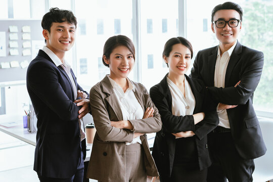 Group portrait of Asian business people