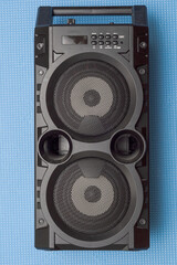 portable music speaker wireless black on blue background