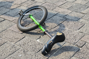 Unicycle used by clowns and jugglers. © Byron Ortiz/Wirestock