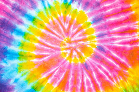 abstract rainbow spiral tie dye background.