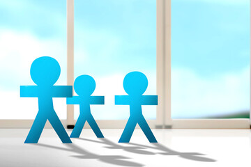 Blue people paper standing with the window background