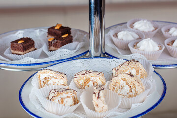 Some bizet cakes. Cakes with chocolate and whipped cream.