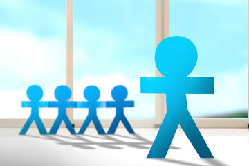 Blue people paper holding hands standing