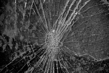 The broken windshield of the car .Destruction due to an accident or road accident.
