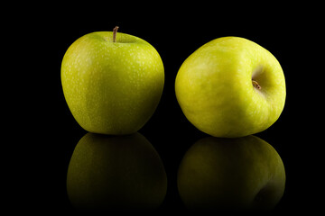 apple on a black background