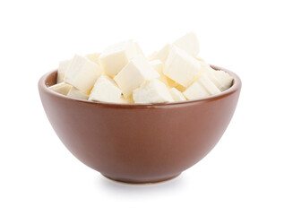 Bowl with pieces of feta cheese on white background