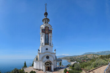 Fototapeta na wymiar Lighthouse church tower near Alushta town