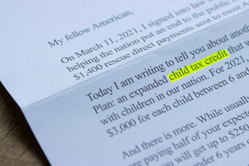 Fototapeta premium Closeup of a letter from IRS dated July 2, 2021, explaining about the expanded child tax credit as a part of the American Rescue Plan by the Biden Administration.