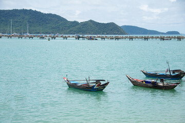 beautiful sea summer with boat at Chalong bay, Phuket province, Thailand. subject is blurred and noise.