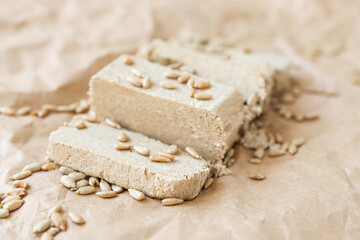 Halva pieces with sunflower seeds close-up. Turkish dessert.