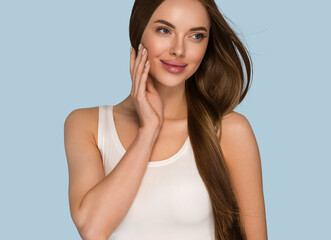 Fototapeta premium Beautiful woman with long smooth brunette hair clean beautiful skin