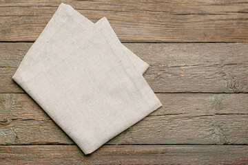 Fabric napkin on wooden background