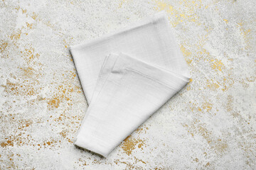 Fabric napkin on grunge background