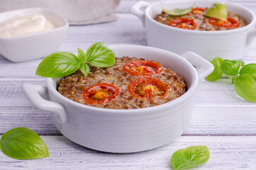Buckwheat casserole with tomatoes